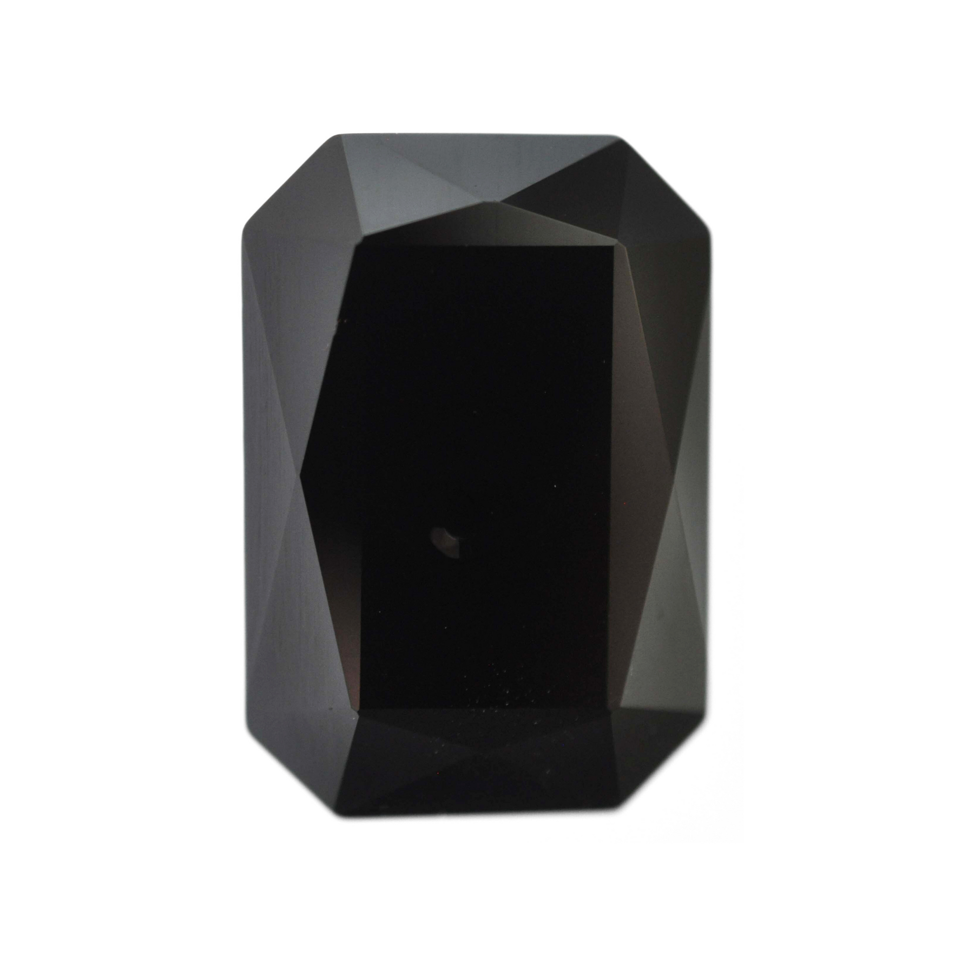 One large octagon shape faceted Austrian crystal rhinestones in the color Jet displayed on a white background.