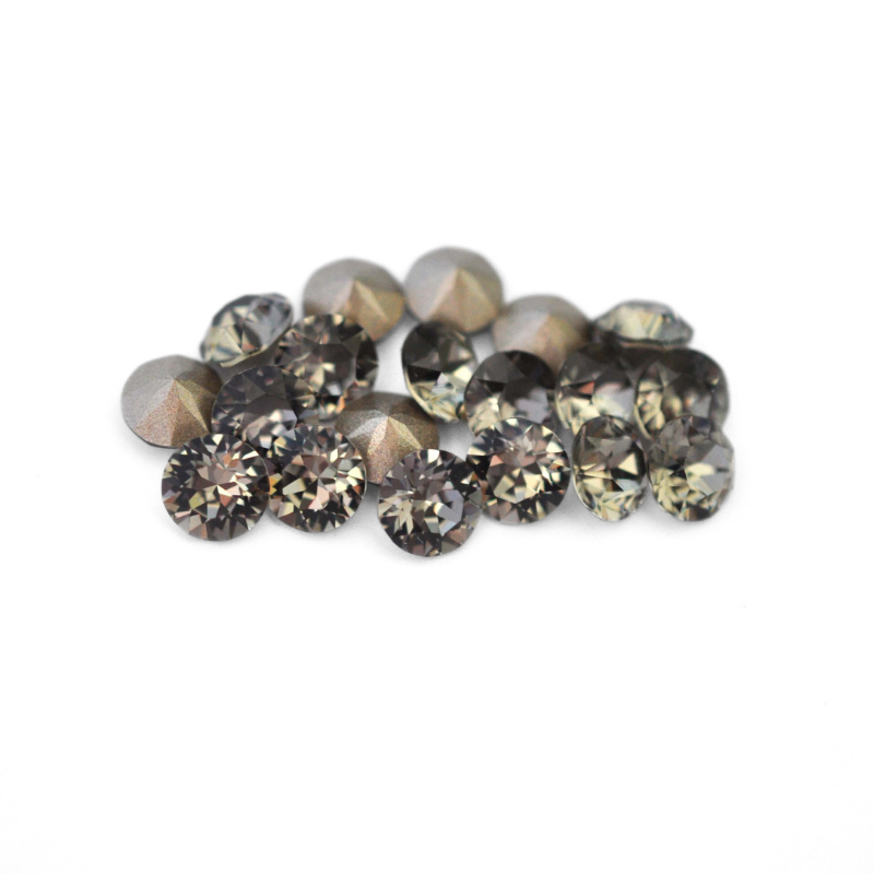 Round faceted Austrian crystal rhinestones in the color Black Diamond displayed on a white background