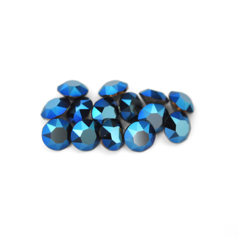 Round faceted Austrian crystal rhinestones in the color Metallic Blue displayed on a white background