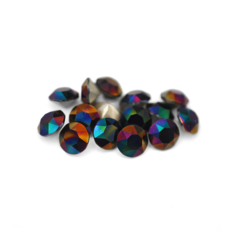 Round faceted Austrian crystal rhinestones in the color Rainbow Dark displayed on a white background
