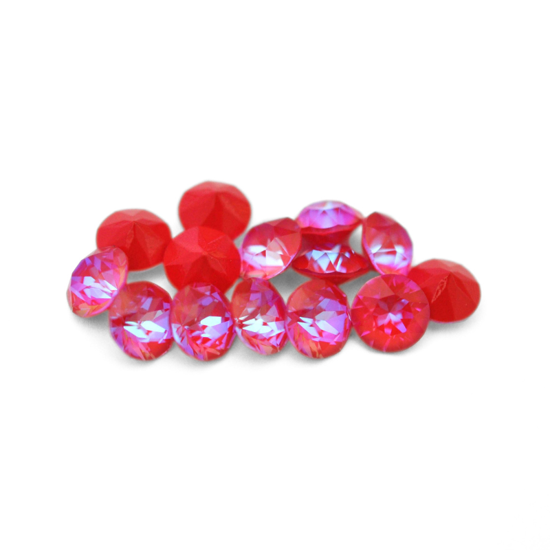 Round faceted Austrian crystal rhinestones in the color Royal Red Delite displayed on a white background