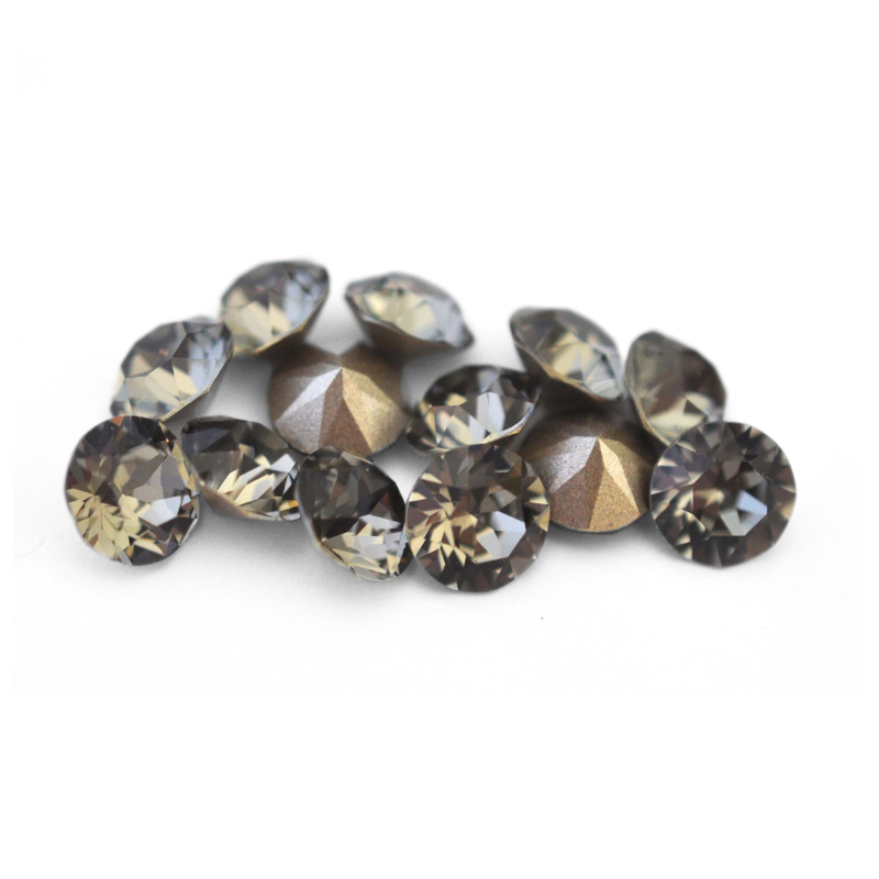 Round faceted Austrian crystal rhinestones in the color Black Diamond displayed on a white background.
