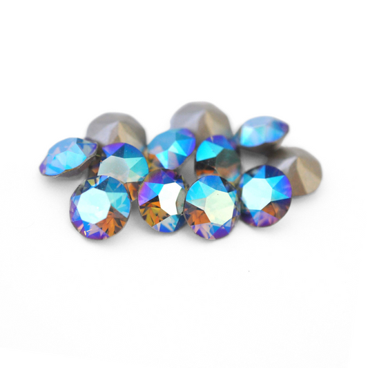 Round faceted Austrian crystal rhinestones in the color Black Diamond Shimmer displayed on a white background.