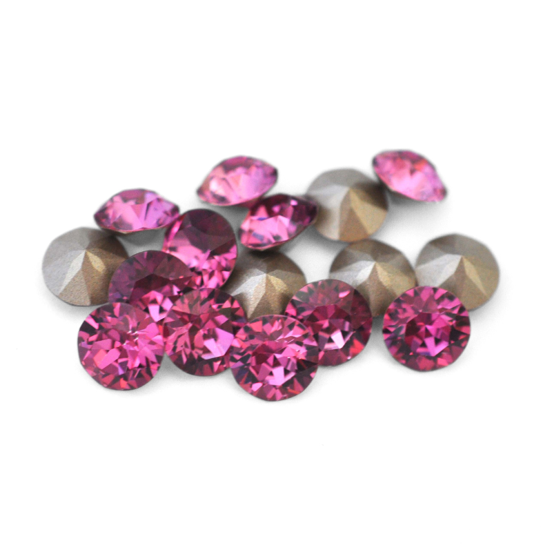 Round faceted Austrian crystal rhinestones in the color Dark Rose displayed on a white background.