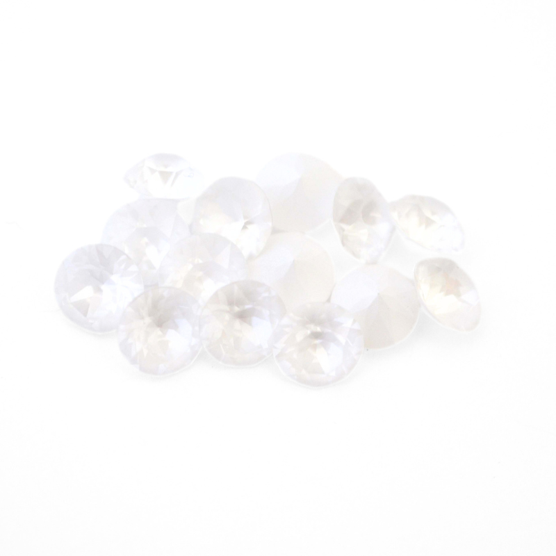Round faceted Austrian crystal rhinestones in the color Electric White Ignite displayed on a white background.
