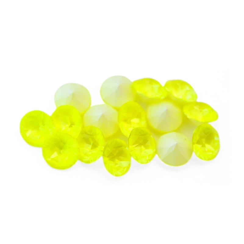 Round faceted Austrian crystal rhinestones in the color Electric Yellow Ignite displayed on a white background.