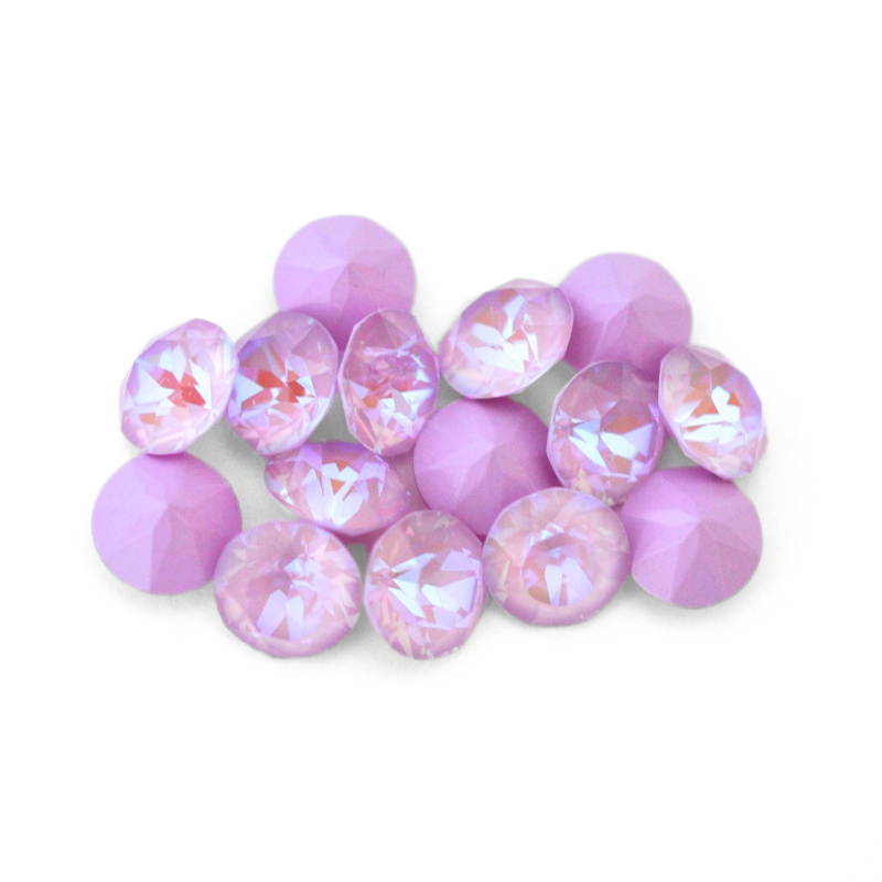 Round faceted Austrian crystal rhinestones in the color Lavender Delite displayed on a white background.
