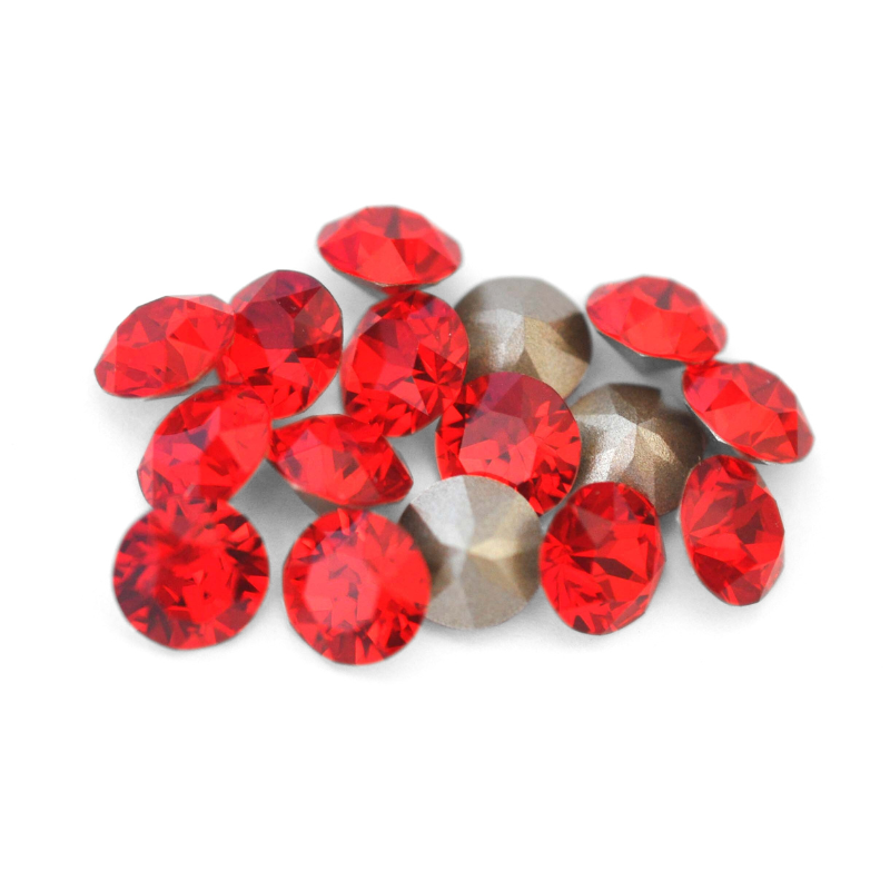 Round faceted Austrian crystal rhinestones in the color Light Siam displayed on a white background.
