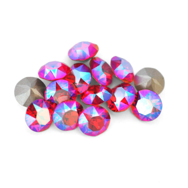 Round faceted Austrian crystal rhinestones in the color Light Siam Shimmer displayed on a white background.