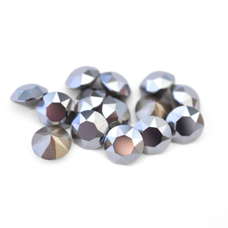 Round faceted Austrian crystal rhinestones in the color Light Chrome displayed on a white background.