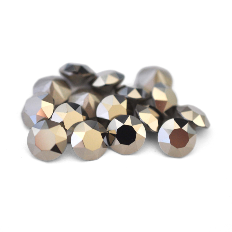 Round faceted Austrian crystal rhinestones in the color Metallic Light Gold displayed on a white background.