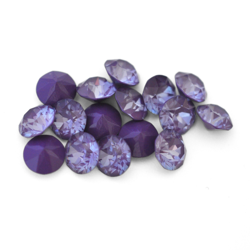 Round faceted Austrian crystal rhinestones in the color Purple Ignite displayed on a white background.