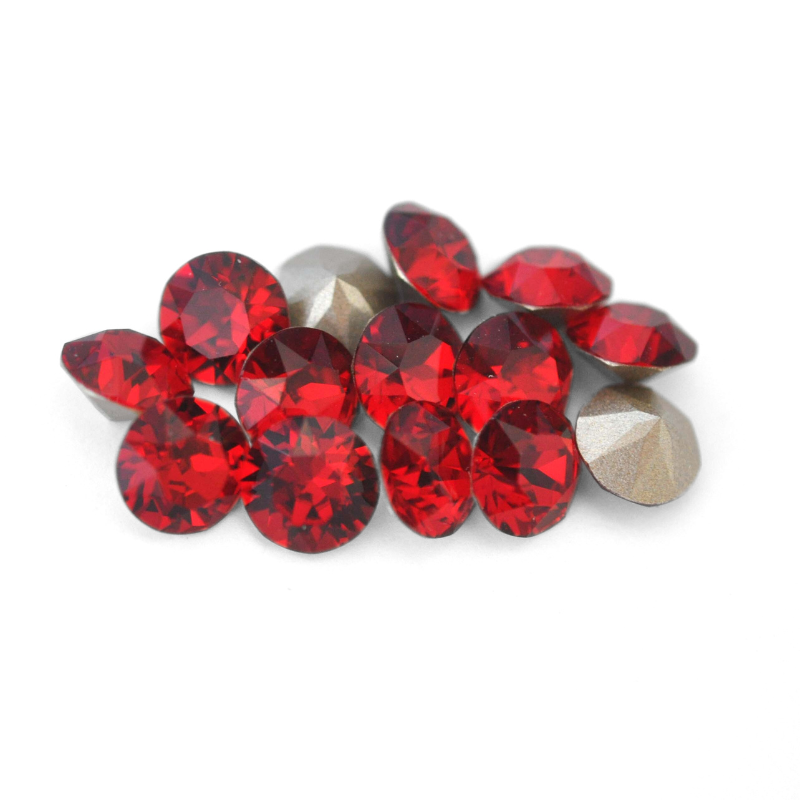 Round faceted Austrian crystal rhinestones in the color Siam displayed on a white background.