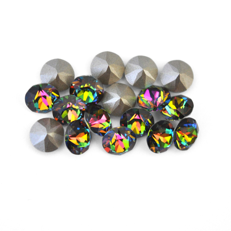 Round faceted Austrian crystal rhinestones in the color Vitrail Medium displayed on a white background.