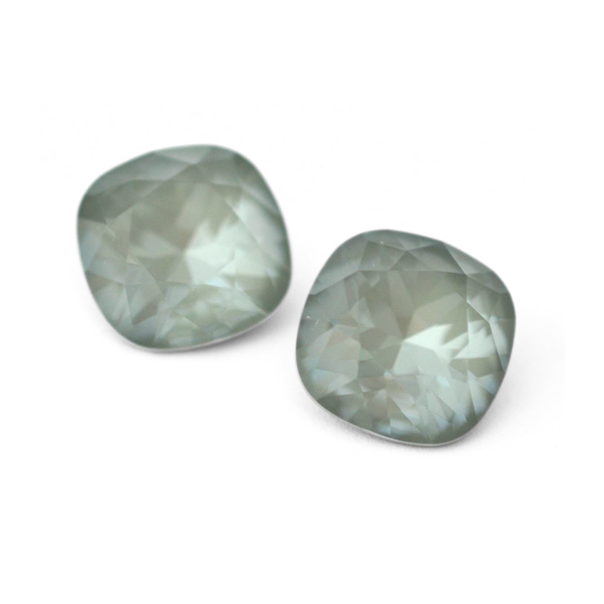 Cushion Square faceted Austrian crystal rhinestones in the color Agave Ignite displayed on a white background.