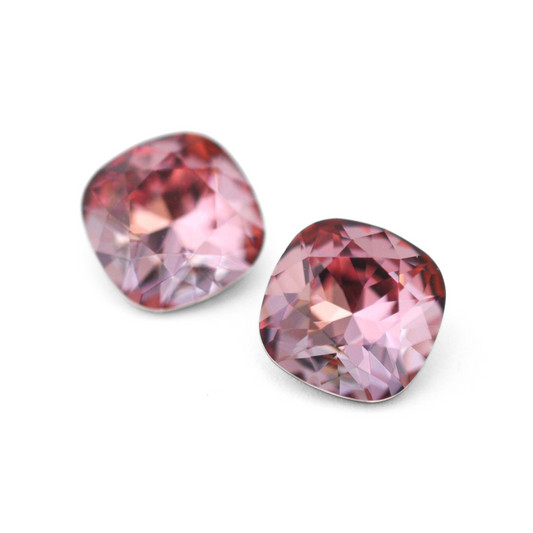 Cushion Square faceted Austrian crystal rhinestones in the color Antique Pink displayed on a white background.
