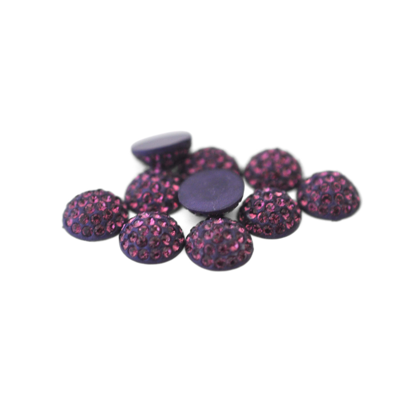 Round Pave Cabochons with Austrian crystal rhinestones in the color Amethyst displayed on a white background