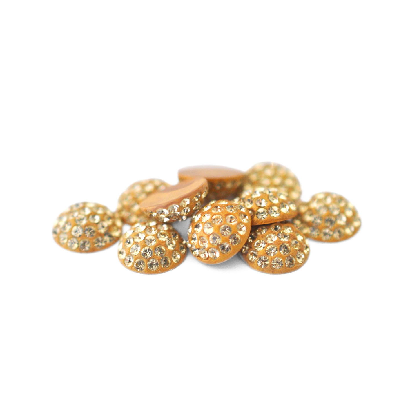 Round Pave Cabochons with Austrian crystal rhinestones in the color Jonquil displayed on a white background