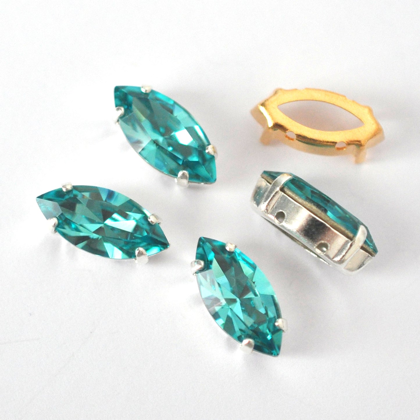 Light Turquoise 15x7mm Navette Sew On Crystals - 4 Pieces