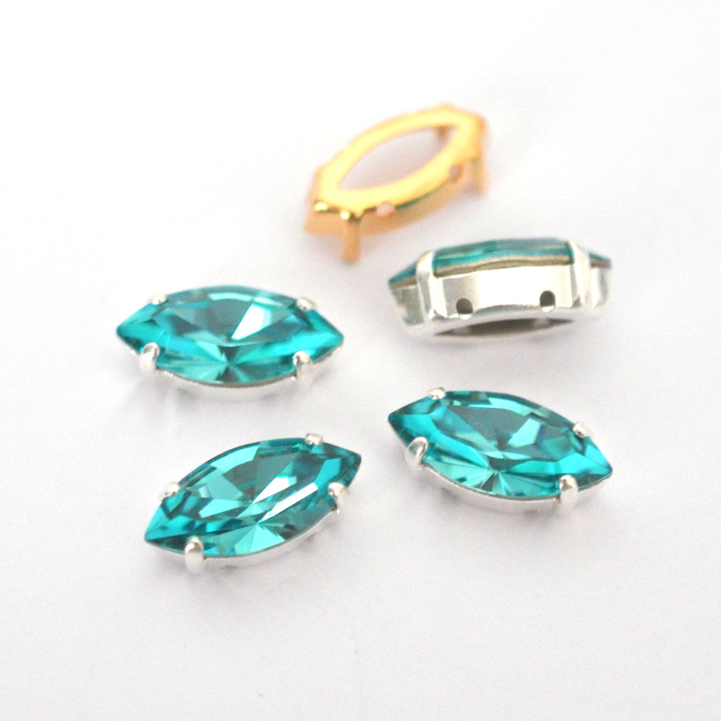 Light Turquoise 15x7mm Navette Sew On Crystals - 4 Pieces