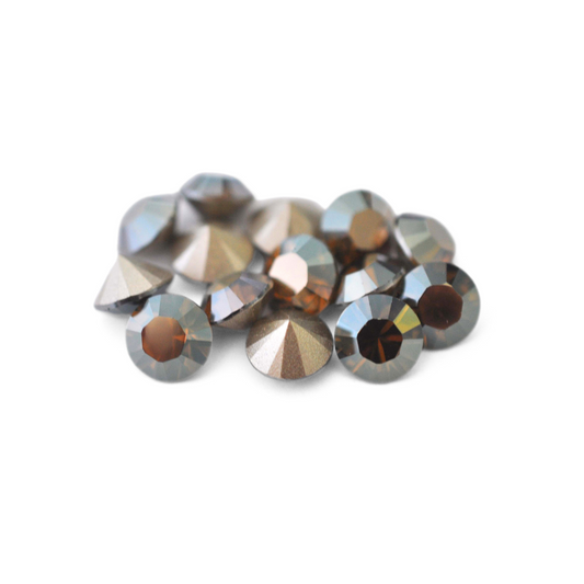 Round Austrian Crystal Article 1028 Chatons in the color Bronze Shade displayed on a white background. 