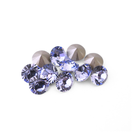 Round Austrian Crystal Article 1028 Chatons in the color Provence Lavender displayed on a white background. 