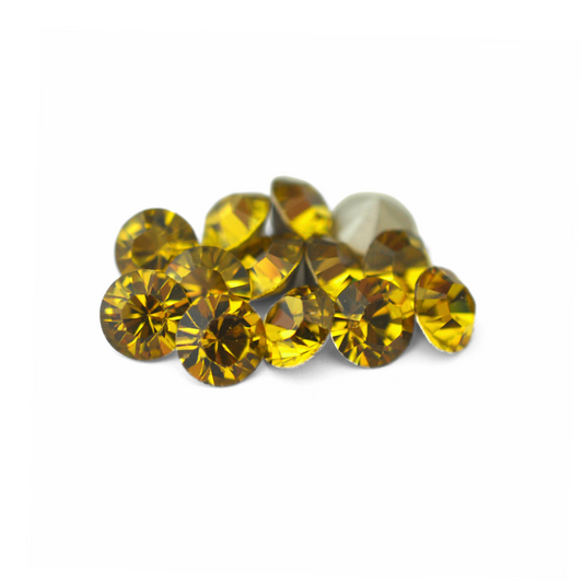Round Austrian Crystal Article 1028 Chatons in the color Vintage Lime displayed on a white background. 