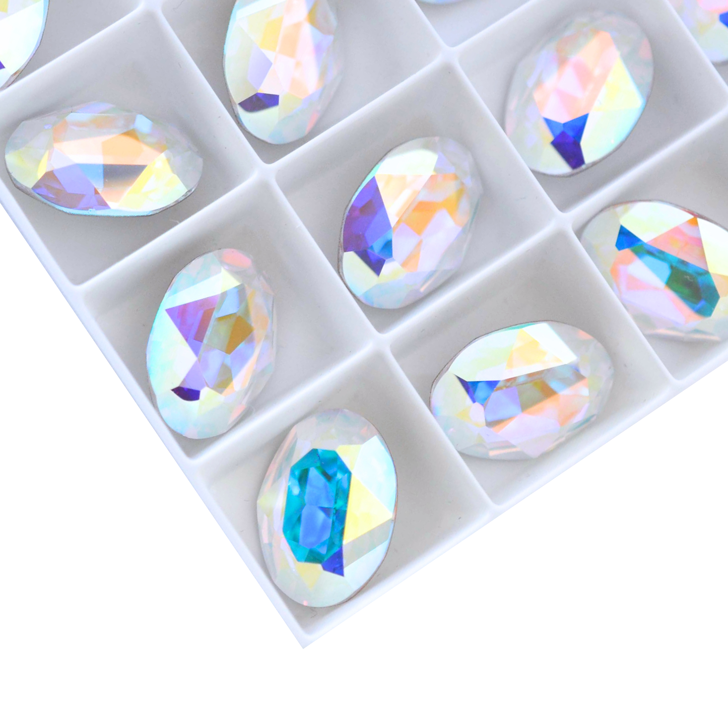 Oval shape faceted Austrian crystal rhinestones in the color Crystal AB displayed on a white background.