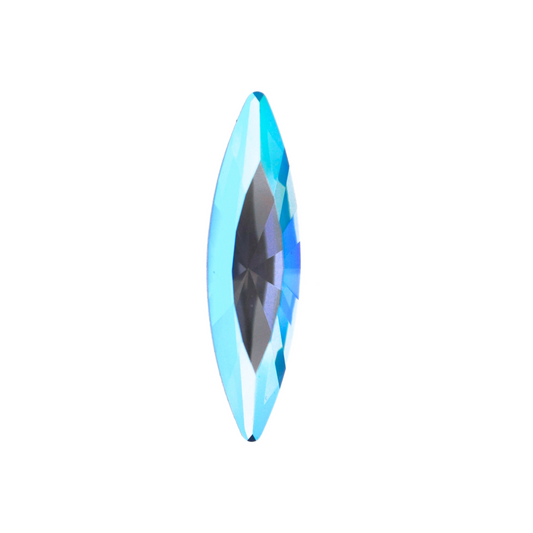 One large navette shape faceted Austrian crystal rhinestones in the color Denim Blue Shimmer displayed on a white background.