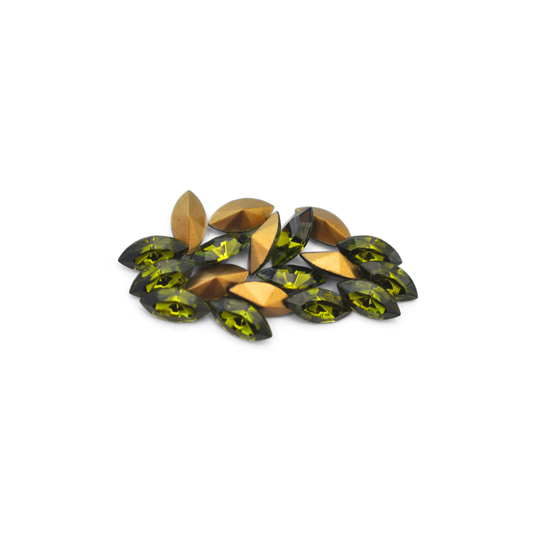 Navette shaped faceted Austrian crystal rhinestones in the color Olivine displayed on a white background.