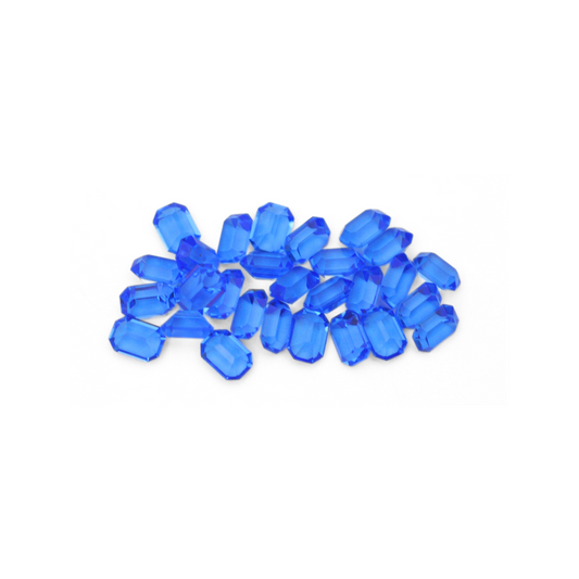 Octagon shaped faceted Austrian crystal rhinestones in the color Sapphire displayed on a white background. 