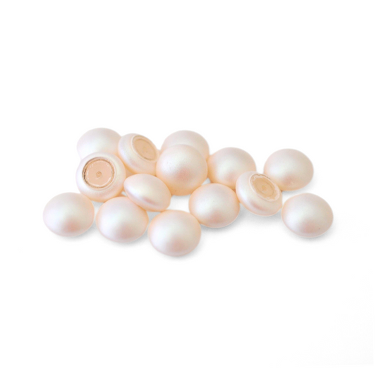 Round Austrian Crystal Glass Pearl Cabochons in the color Pearlescent White displayed on a white background
