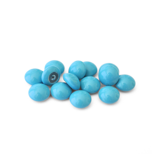 Round Austrian Crystal Glass Pearl Cabochons in the color Turquoise displayed on a white background