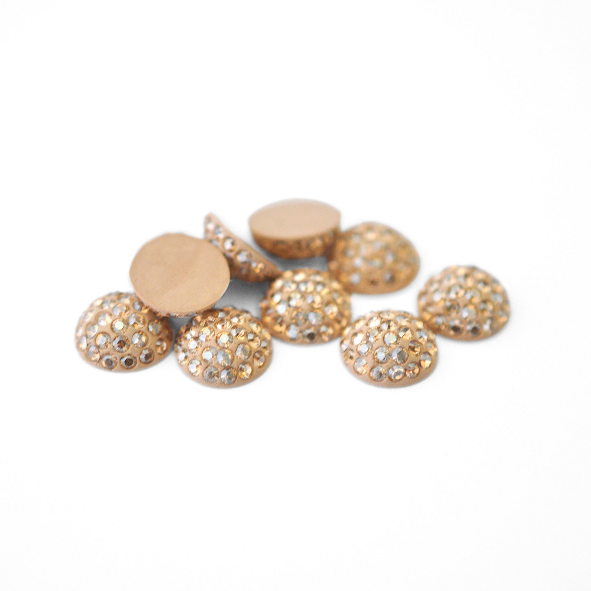 Round Pave Cabochons with Austrian crystal rhinestones in the color Golden Shadow displayed on a white background