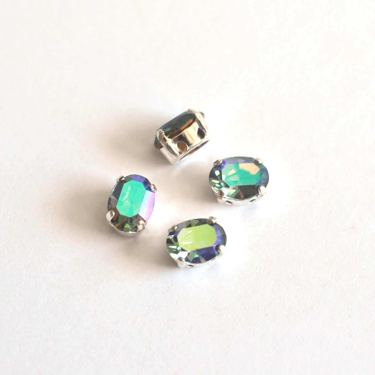 Indian Sapphire AB 8x6mm Sew On Set Ovals - 4 Pieces