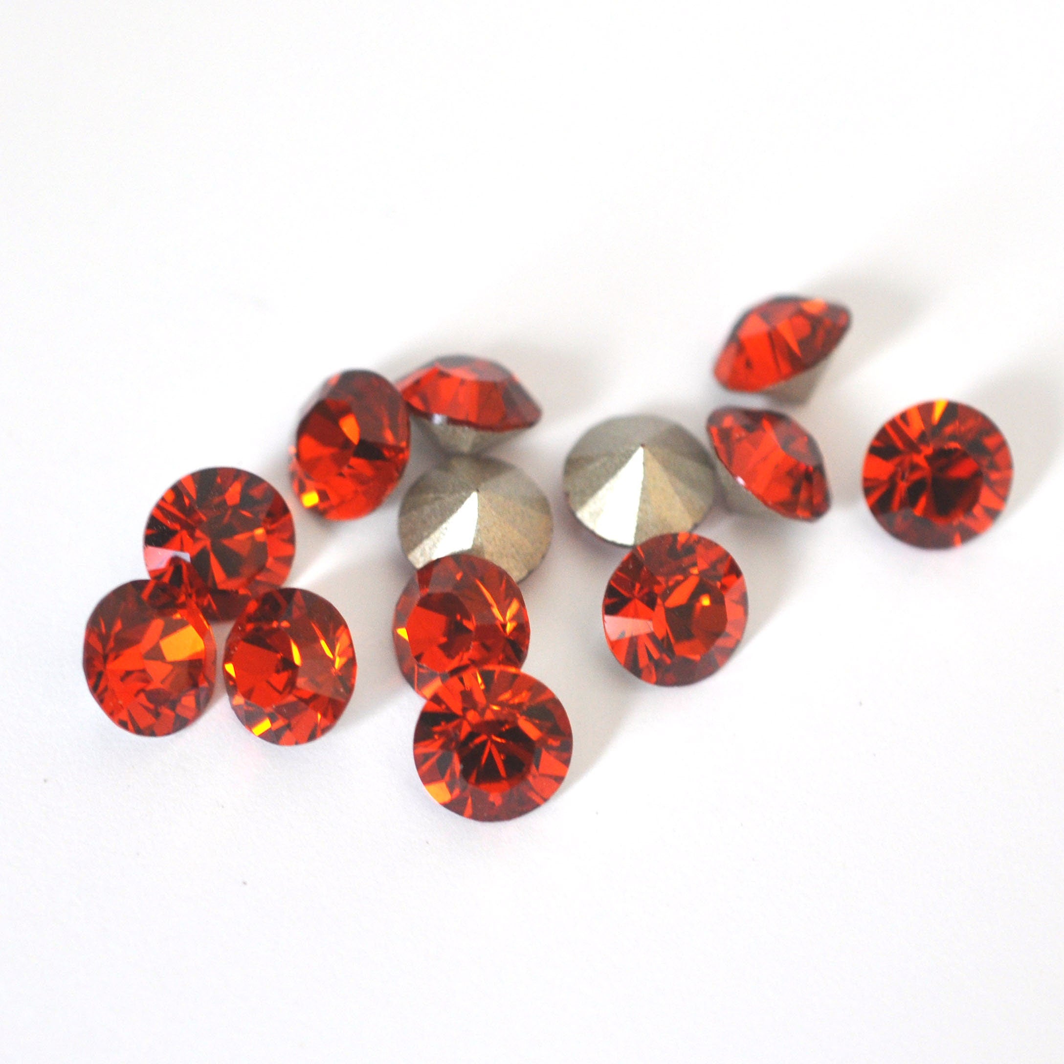 Indian Red 1028 Pointed Back Chaton Barton Crystal 39ss, 8mm