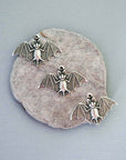 Antique Silver Ox Swooping Brass Bat Charm