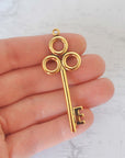 Antique Gold Ox Large Key Brass Charm Stamping - AGB140