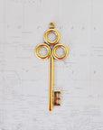 Antique Gold Ox Large Key Brass Charm Stamping - AGB140
