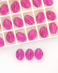 Fuchsia 14x10mm Faceted Oval Beads 5050 Barton Crystal